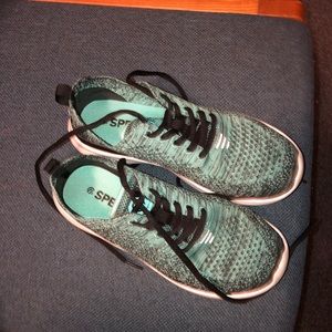 Turquoise and black light athletic shoes